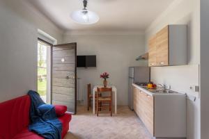 Kuchyň nebo kuchyňský kout v ubytování Pulciano Apartments