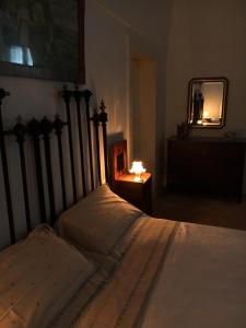 A bed or beds in a room at Casa Vacanza-La Bruna