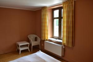 Postel nebo postele na pokoji v ubytování Auberge de Bouvignes