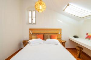 Postel nebo postele na pokoji v ubytování Tinos La belle vie + 35 fotografií