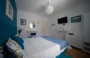 Postel nebo postele na pokoji v ubytování ASTAKOS apartments Budva