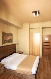 Voodi või voodid majutusasutuse Kantar Hostel toas
