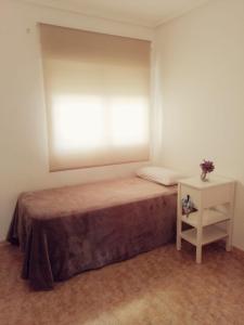 Cama o camas de una habitación en Apartamento Juan Sebastian El Cano