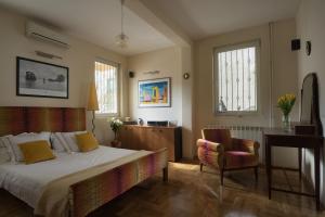 Postel nebo postele na pokoji v ubytování ASTAKOS apartments Budva