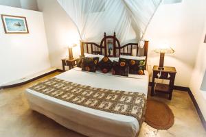 Letto o letti in una camera di The Swahili House