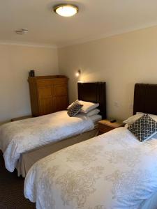 Ένα ή περισσότερα κρεβάτια σε δωμάτιο στο Oakrooms