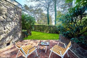 Zahrada ubytování Le Manoir Hôtel
