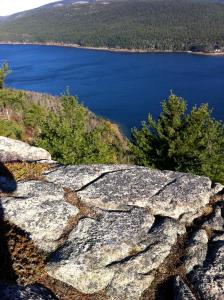 a view of a lake from a rocky mountain at Canterbury Suites B&B in Bar Harbor