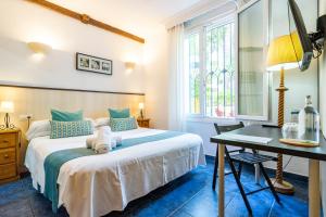 Un pat sau paturi într-o cameră la Elcano
