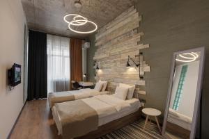 Voodi või voodid majutusasutuse RIS Dalma Collection Yerevan toas