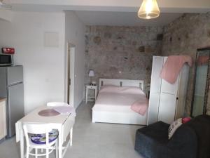 Postel nebo postele na pokoji v ubytování Apartment Iris