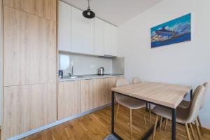Kuchyň nebo kuchyňský kout v ubytování Blue Marlin Apartments