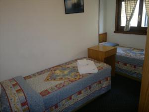 Letto o letti in una camera di Hotel Marguareis