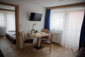 A bed or beds in a room at Apart Corona