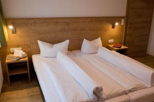 A bed or beds in a room at Apart Corona