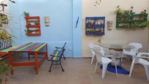 a dining room with a table and chairs at Villa Marina in Jerez de la Frontera