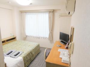 TV a/nebo společenská místnost v ubytování Urban Hotel Sanko