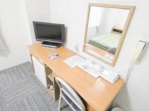 TV a/nebo společenská místnost v ubytování Urban Hotel Sanko