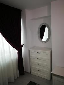 Postel nebo postele na pokoji v ubytování Apartament complex Bacovia