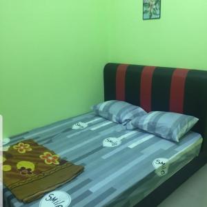 Postel nebo postele na pokoji v ubytování Teratak Nipah Homestay Teluk Nipah Pangkor + 29 fotografií