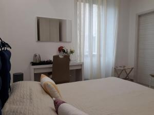 Postel nebo postele na pokoji v ubytování Rosa del Salento