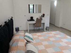 Postel nebo postele na pokoji v ubytování Rosa del Salento