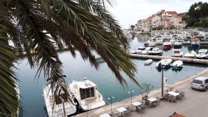 a group of boats docked in a marina at Studio Udica in Podgora