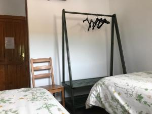 Postel nebo postele na pokoji v ubytování Entrerrobles