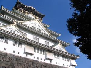 a large white building with a tall tower at Hotel Oaks Early-Bird Osaka Morinomiya/ Vacation STAY 28691 in Osaka