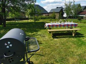Zahrada ubytování Zythogite Appartement 8 personnes avec jardin, bbq