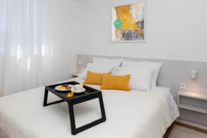 Postel nebo postele na pokoji v ubytování Luxury Apartment La Mer