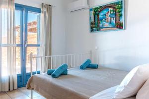 Postel nebo postele na pokoji v ubytování KEA'S VILLA + 19 fotografií