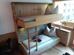 Łóżko lub łóżka w pokoju w obiekcie Apartment Luna incl Summercard Zell am See Kaprun