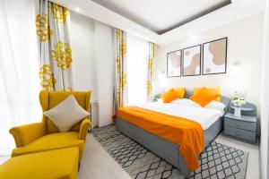 Letto o letti in una camera di Relax Comfort Suites Hotel