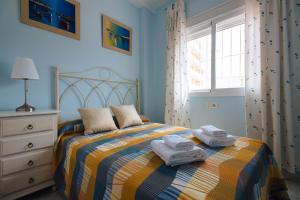 Posteľ alebo postele v izbe v ubytovaní Playa del Cantil, 3 bedrooms and 2 free parking