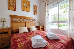 Posteľ alebo postele v izbe v ubytovaní Playa del Cantil, 3 bedrooms and 2 free parking