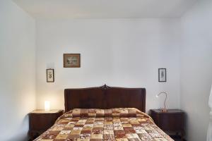 Ένα ή περισσότερα κρεβάτια σε δωμάτιο στο Casa Renata free covered private parking