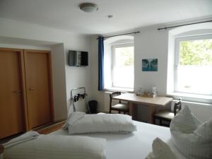Posteľ alebo postele v izbe v ubytovaní Ferienhaus Kolbnitz