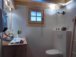 Koupelna v ubytování Chalets Ile des Barrats