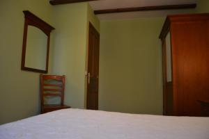 Cama o camas de una habitación en Casas Rurales Las Corradas