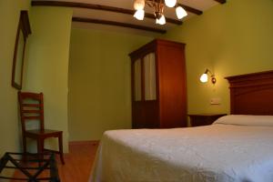Cama o camas de una habitación en Casas Rurales Las Corradas