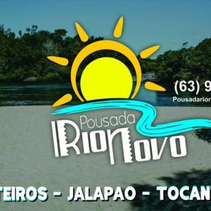 um sinal para um resort com sol em Pousada Rio Novo Jalapão em Mateiros