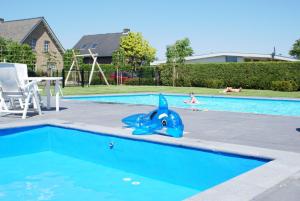 The swimming pool at or close to Domein Hellebeuk met UITZICHT! Valkenburg/Klimmen