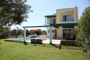 Fotografia z galérie ubytovania TEO-VILLA-1, private pool, sea and golf v destinácii Afantou