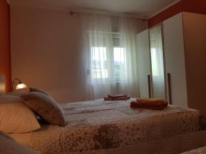 Postel nebo postele na pokoji v ubytování Rooms Neda