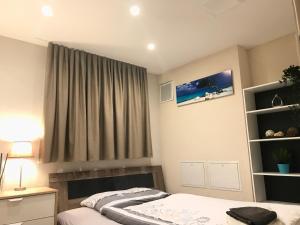 Postel nebo postele na pokoji v ubytování Apartment im Emmental