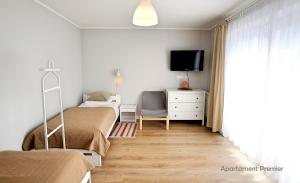 Biały Dom - 2 Bedrooms tesisinde bir odada yatak veya yataklar