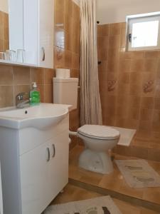 Koupelna v ubytování Rooms Neda