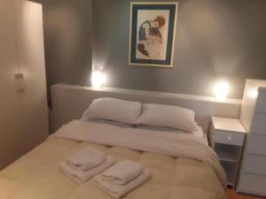Posteľ alebo postele v izbe v ubytovaní Deluxe Apartment Best Point