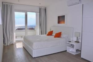 Posteľ alebo postele v izbe v ubytovaní Villa Mel II + 29 fotografií